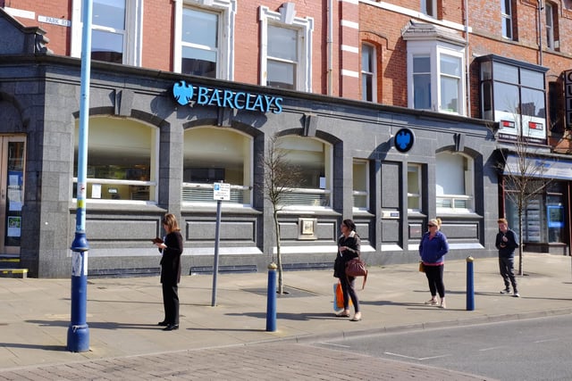 People queue for Barclays Bank in St Annes