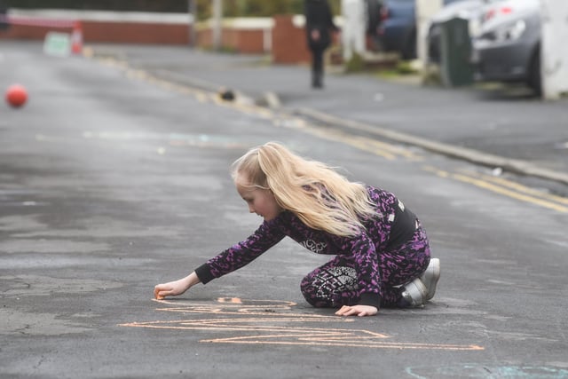 This young resident was delighted to have the opportunity to make her mark at Blackpool's first Play Street in Clevedon Road.