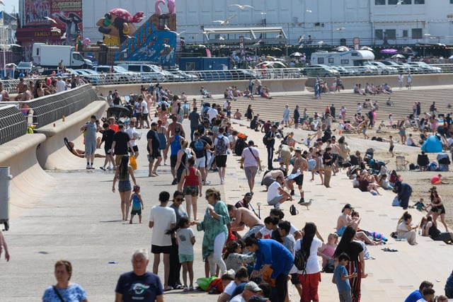 Visitors galore enjoying Blackpool seafront on the hottest day of the year. Photo: Kelvin Stuttard