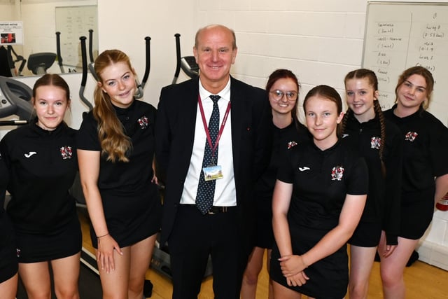 John Armfield is retiring from St Aidan's Church of England High School after 37 years. The PE teacher is pictured with some of the pupils.