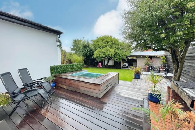 Hardwood raised decking for the back garden with a fabulous leisure pool and lawn