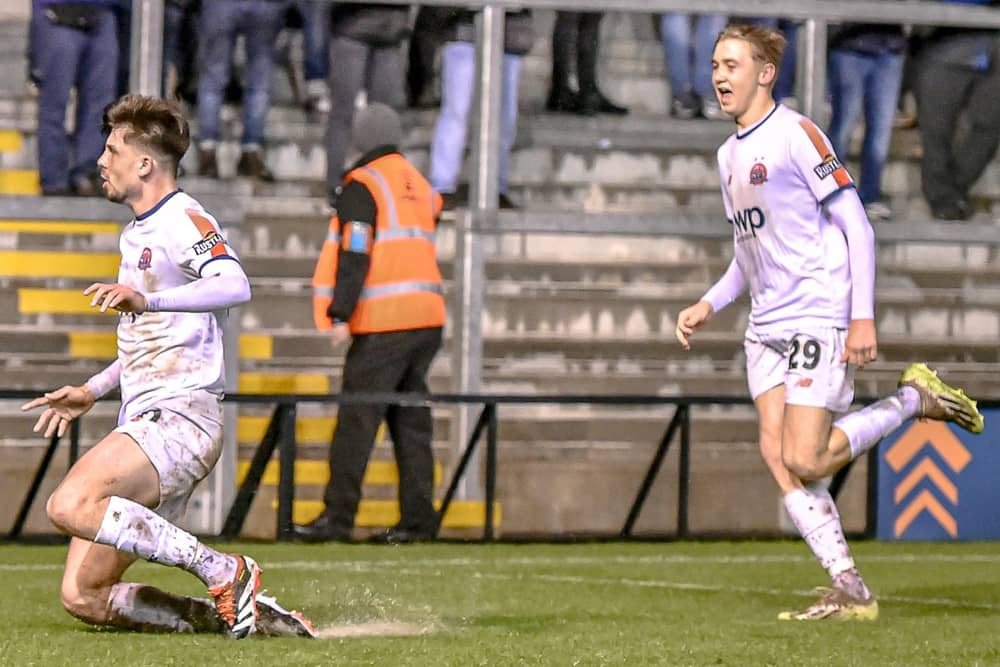 AFC Fylde's Ethan Mitchell celebrates his goal, accompanied by Danny Ormerod Picture: Steve McLellan