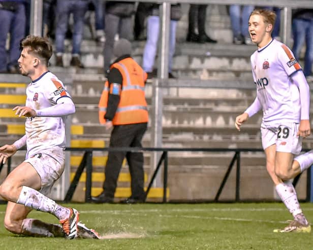 AFC Fylde's Ethan Mitchell celebrates his goal, accompanied by Danny Ormerod Picture: Steve McLellan