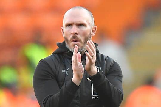 Michael Appleton applauds the Blackpool faithful after Saturdays' win