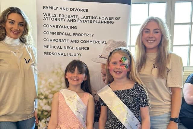 Vincents Solicitors volunteers with two of the retinue princesses at the Poulton Gala fundraising event