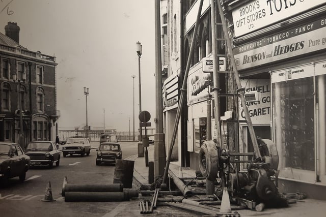 This was 1973 and the caption on the back of the photo says 'Machinery has been erected on a section of pavement at Houndshill in Blackpol, where boreholes are being drilled. The soil was being tested at certain points in preparation for future redevelopment at the Palatine Hotel block