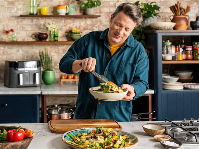 Jamie Oliver dishes up a new recipe on Jamie's Air Fryer Meals (Picture: Chris Terry/Jamie Oliver Enterprises/Channel 4)