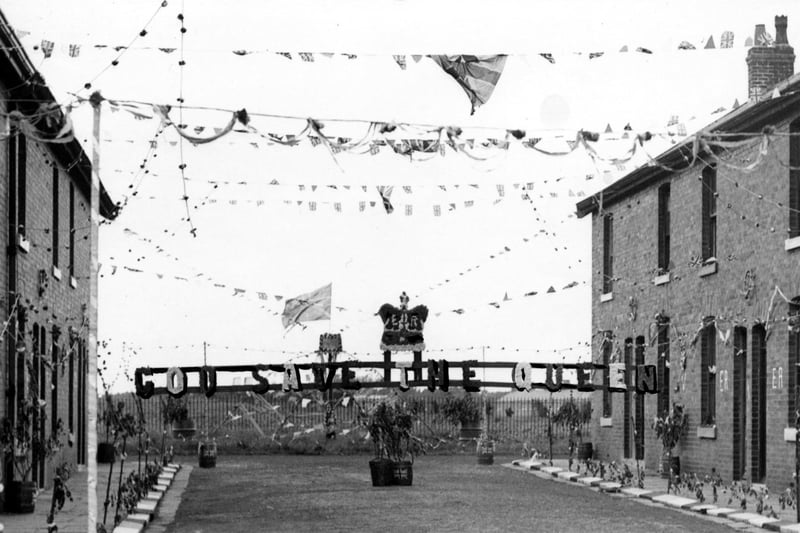 Bunting bedecked Rock Street, Burn Naze, Thornton, ready for its Coronation Day street party in 1953