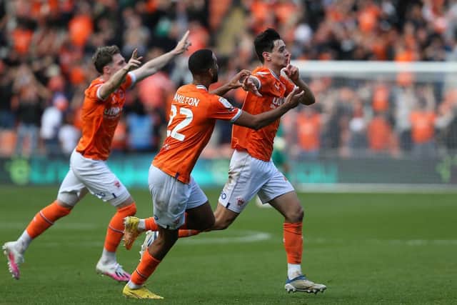 Charlie Patino shushes the away fans after restoring Blackpool's lead