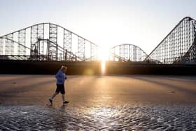 Prime Minister Boris Johnson running along Blackpool beach on the final day of the Conservative Party Spring Conference 
Photograph credit: Conservative Party/ @Conservatives