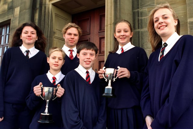 Some pupils from Morecambe High School - Ben Darnborough, Ryan Elderton, Jackson Green, Corinne Hallam, Natalie Mace and Georgina Sharples - were presented awards at annual prize giving by Mr Trinnick, chief education officer