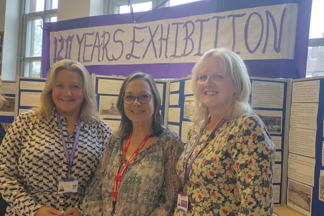 Thames Primary Academy headteacher Julie Allison (left) with staff member Adele Royston (right), who compiled the exhibition, and historian Anne Charlesworth.