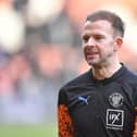 Jordan Rhodes is 'desperate' to play against Stevenage. He missed Blackpool's midweek win against against Bolton (Image: Camera Sport)