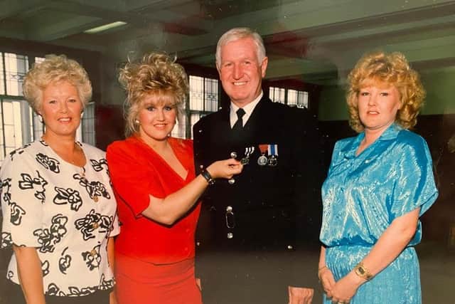 Kenneth Mackay wit family after he was awarded The Queens police medal in 1991 -.from left, Beryl Mackay, Lindsay Mackay, Kenneth Mackay, Tracey Lawrence.
