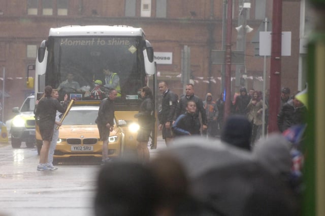 The rain was so heave that the flame on the torch went out and had to be re-lit on the coach