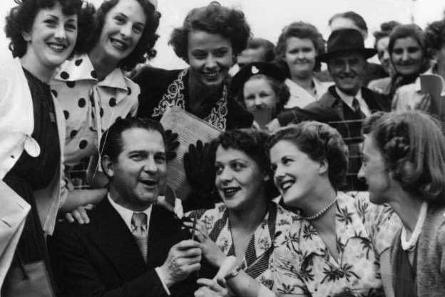 Donald Peers signs autographs in Blackpool, 1950