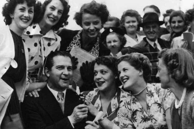 Donald Peers signs autographs in Blackpool, 1950