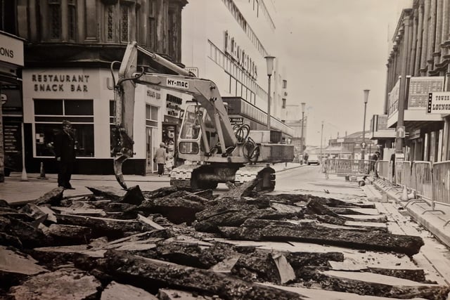 This was May 1973 - a digger at work in Bank Hey Street