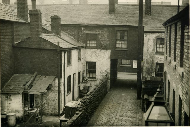 This was Wilkinson's Yard in the 1930s - long gone. The photo looks towards Bonny Street seen through the archway. These old streets formed part of the triangular area which is now being redeveloped almost a century later.