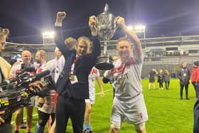 Blackpool's Nick Kennedy (right) lifts the Physical Disability RL World Cup with Castleford Tigers teammate Mark Gummerson