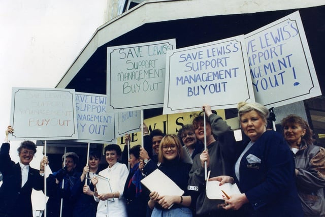 Placard carrying staff protest outside Lewis's in Blackpool against the store's proposed closure in 1991