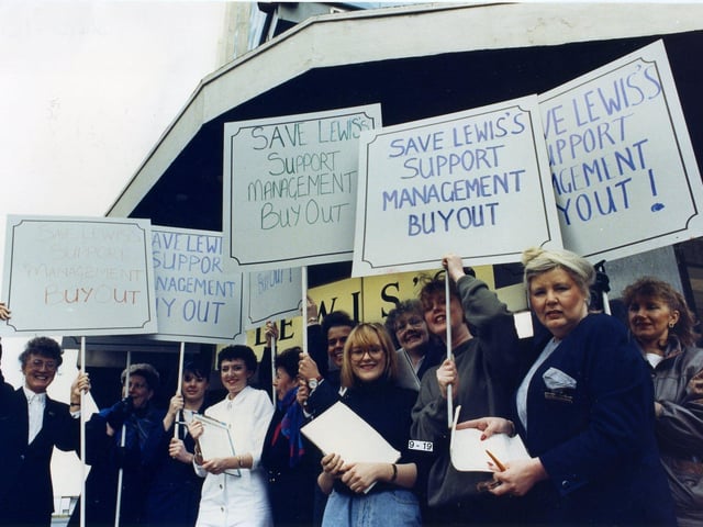 Placard carrying staff protest outside Lewis's in Blackpool against the store's proposed closure in 1991