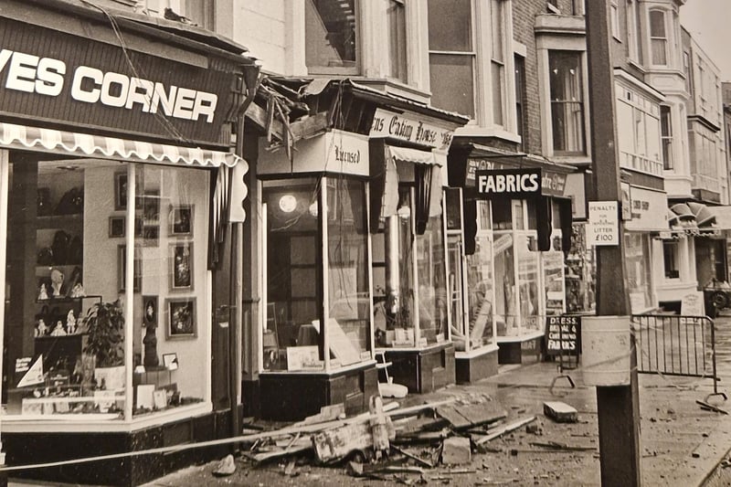 Debris on the pavement in Queen Street after storm damage to a roof in the 1980s