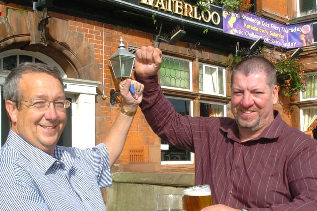Pub licensee John Horne (left) and Waterloo Bowls Manager Jim Parker at the Waterloo Pub. The pair were celebrating after saving the pub from closure.