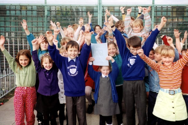 Pupils at St Cuthbert's RC Primary School celebrating a successful OFSTED inspection in 1997