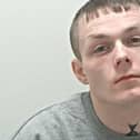 Lee Barr is wanted on recall to prison (Credit: Lancashire Police)