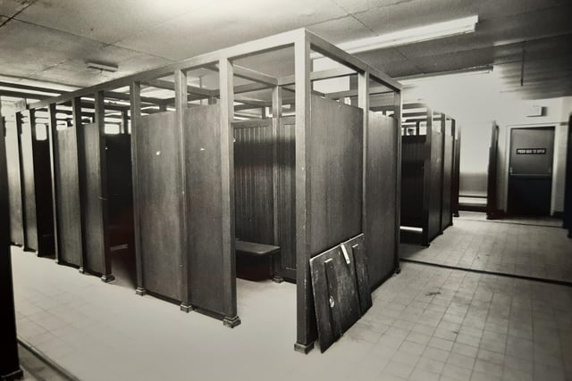 The changing rooms. One of the doors is propped up on the side - a far cry from the bustling days of the pool in its heyday