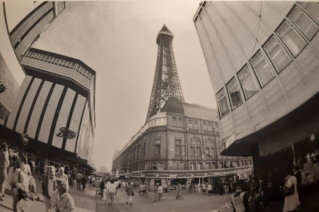 This is the junction of Bank Hey Street and Victoria Street in the mid 1980s. Boots to the left and the American Pancake House to the right with the tower standing tall above them