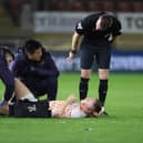Andy Lyons was forced off against Leyton Orient. The Blackpool wing-back is out for a lengthy period. (Image: Camera Sport)