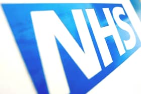 File photo dated 16/11/21 of the NHS logo. Dominic Lipinski/PA Wire. Blackpool man died of alcohol poisoning due to undetected fatty liver disease.