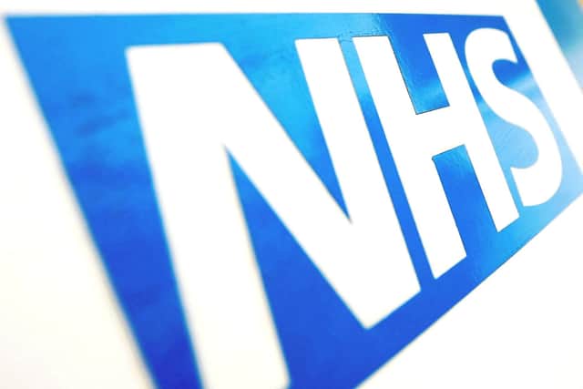 File photo dated 16/11/21 of the NHS logo. Dominic Lipinski/PA Wire. Blackpool man died of alcohol poisoning due to undetected fatty liver disease.