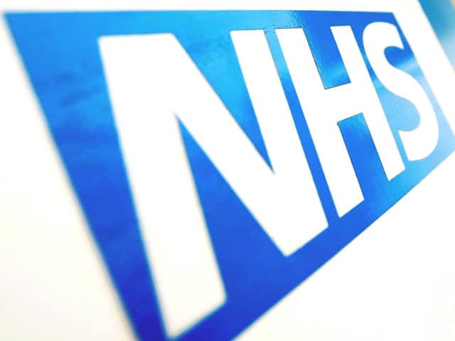 File photo dated 16/11/21 of the NHS logo. Dominic Lipinski/PA Wire. Blackpool man died of alcohol poisoning due to undetected fatty liver disease.