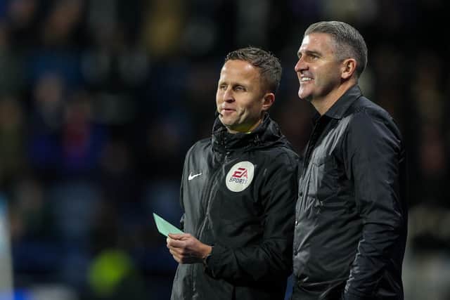 Preston North End manager Ryan Lowe has a word with the fourth official David Webb during the midweek win over Huddersfield Town.