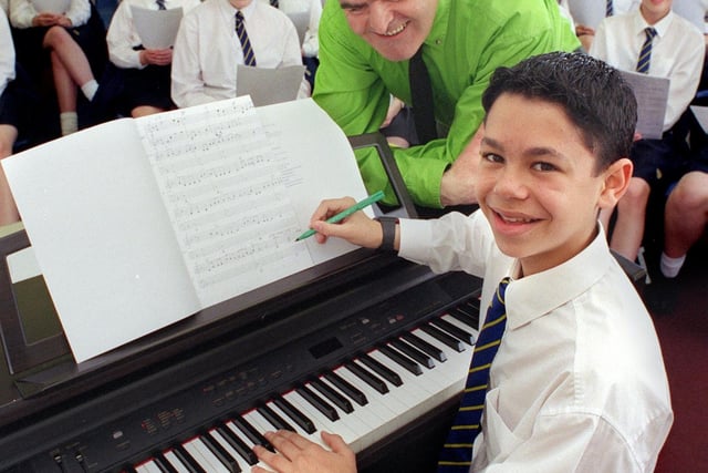 Hodgson High School pupil Daniel Fard puts the finishing touches to his song, helped by professional songwriter Andrew Titcombe in 1999