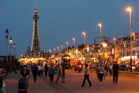 A promenade scene shows a busy Blackpool seafront