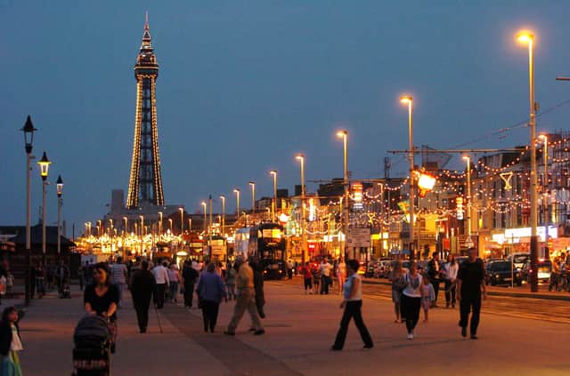 A promenade scene shows a busy Blackpool seafront in 2005