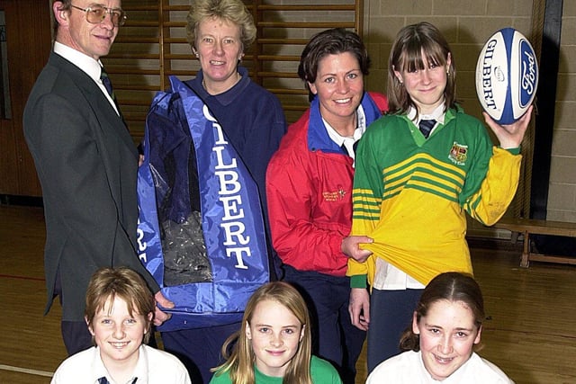 Stuart Ramsey of Fleetwood High School and England International Lesley Gray present equipment to Fleetwood High School. Back, from left, Stuart Ramsey, Head of Girls PE Anne Taylor, Lesley Gray and Nicola Forrest, with Kirsty Gregory, Lacie Freeland and Chelsea Stirzaker at the front.
