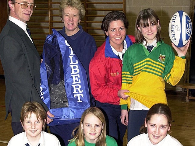 Stuart Ramsey of Fleetwood High School and England International Lesley Gray present equipment to Fleetwood High School. Back, from left, Stuart Ramsey, Head of Girls PE Anne Taylor, Lesley Gray and Nicola Forrest, with Kirsty Gregory, Lacie Freeland and Chelsea Stirzaker at the front.