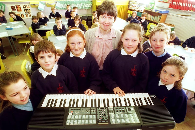 Tyldesley Conservative Club donated an electronic keyboard to Revoe School in 1997. Pictured with Music Co-ordinator Alison Nicholls are L-R: Leeanne Connolly, James Chubbs, Nicola Farmer, Victoria Lapsins, Steven Rider and Amy Webster.