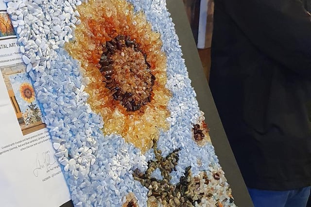 Original artwork of a sunflower made out of crystals by artist Paul Wright. Sold for £80.