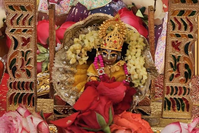 Depiction of Baby Krishna at Blackpool's Asian Festival