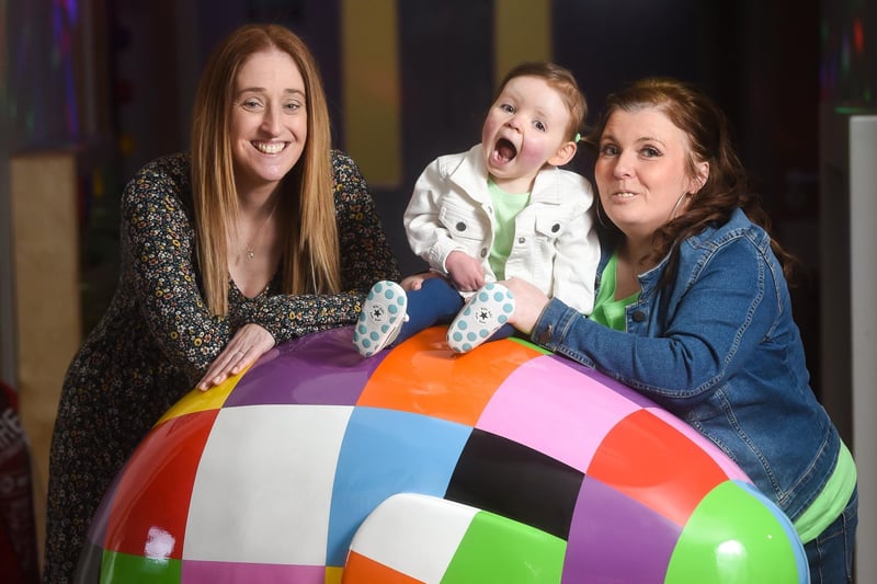 Launch of the Trinity Hospice Elmer Art Trail. Pictured is Linzi Warburton from Trinity with Natalie Ditchfield and 2-year-old daughter Taylor.