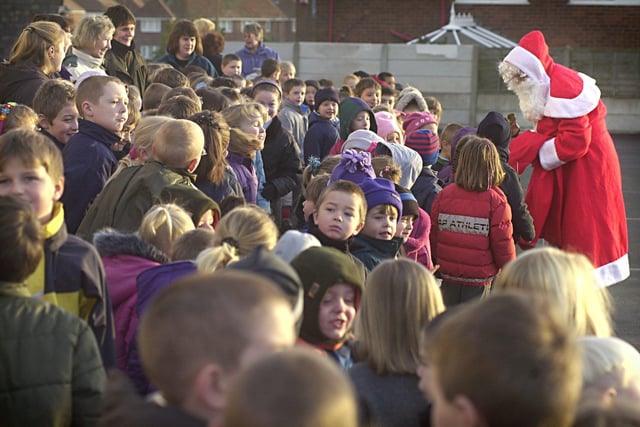Pupils at Layton CP School were paid a visit by Father Christmas, who arrived in a horse-drawn carriage in 2001