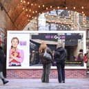 A member of the public interacts with an activation in Borough Yards by Gü to celebrate the launch of Bridget Jones: Mad About the Boy. This Valentine’s week, Gü has unveiled the UK’s first complimenting billboard. The interactive activation serves uplifting compliments inspired by beloved characters from the Bridget Jones franchise. Visitors can also enjoy full sized products from Gü’s signature range. A recent study, conducted by Gü, found that two thirds agreed that receiving a genuine compliment can turn their week around (68%) – not just their day