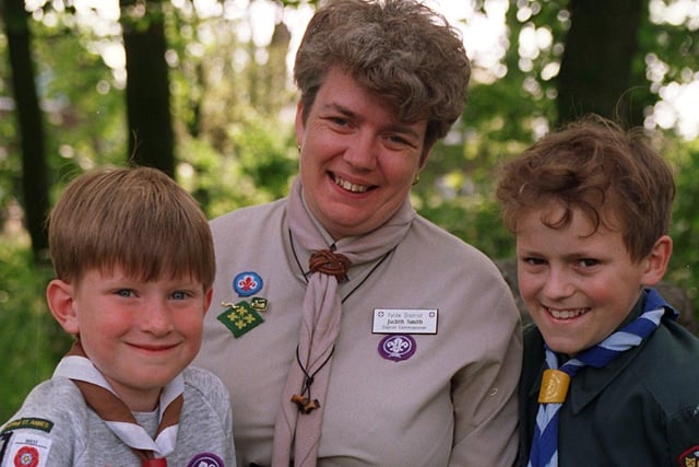 Fylde District Commissioner Judith Smith with scout Philip Bates and cub Stephen Bates