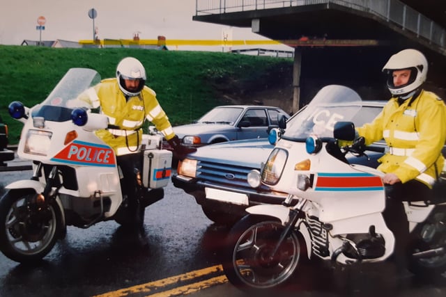Sergeant Keith Shuck (left) and Police Constable Glen Redman flank one offending vehicle back in 1991